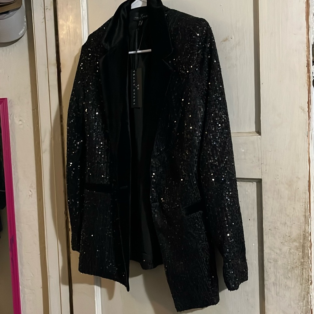Tracy Evan’s black sequin blazer